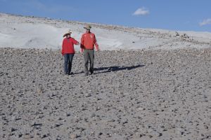 Visitors in a field of volcanic bombs